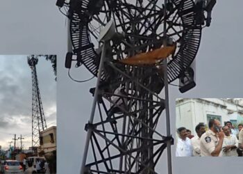 TDP activist Lakshmi Narayana protesting atop BSNL tower in Anantapur