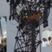 TDP activist Lakshmi Narayana protesting atop BSNL tower in Anantapur
