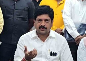 Kollu Ravindra addressing media on YSRCP governance issues