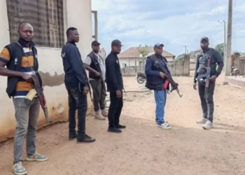 Aftermath of Kwara State terrorist attack showing destroyed homes and burned shops